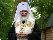 Фото 2. Проповедь после освящения водного источника